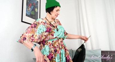 Minia Sniffs A Rose From Her Garden and Masturbates in Lacy Black Stockings