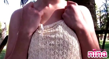 Hot solo lesbian outdoors touches herself